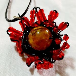 Handmade dragon's egg nest pendant necklace flames beaded jewelry black red gold